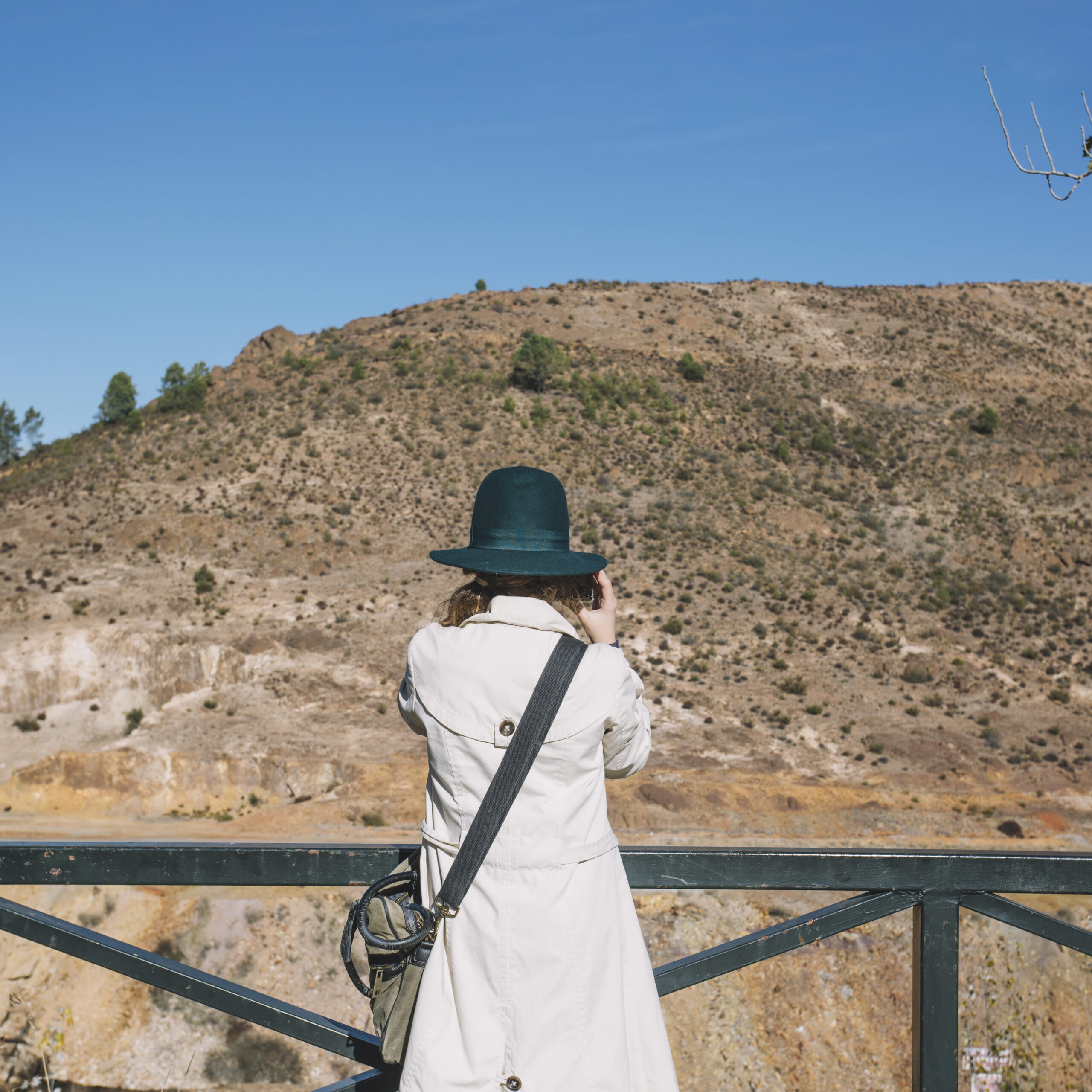 woman-taking-shots-hill